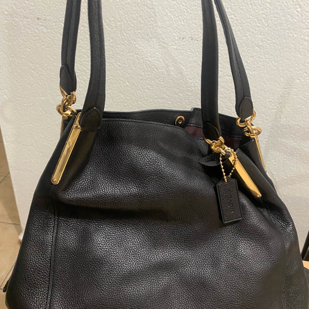 Cartera Coach